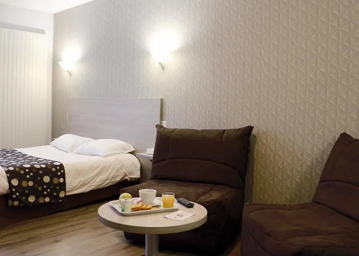 מלון Logis -hotel & Restaurant De La Place אונאי-סור-אודון